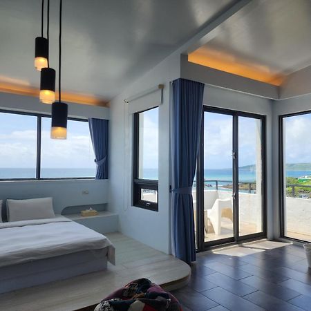 Sea Shore Hotel Manzhou Extérieur photo