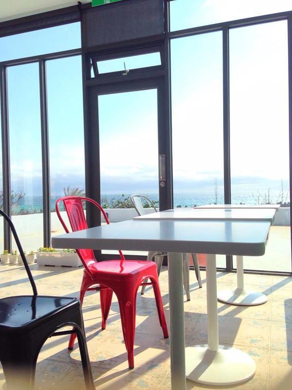 Sea Shore Hotel Manzhou Extérieur photo